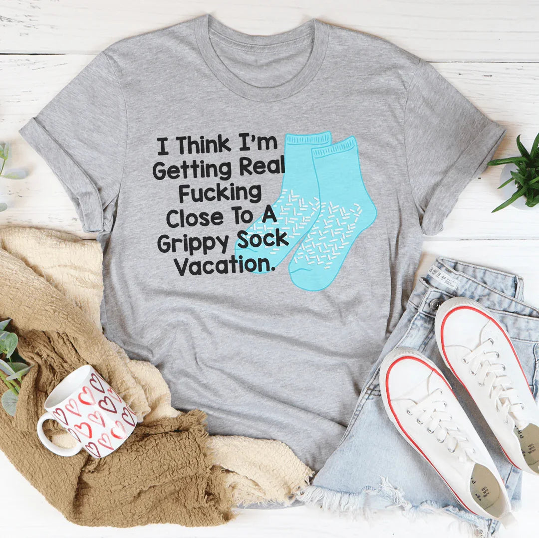I Think I’m Getting Real F-cking Close To A Grippy Sock Vacation Tee Athletic Heather / S Peachy Sunday T-Shirt