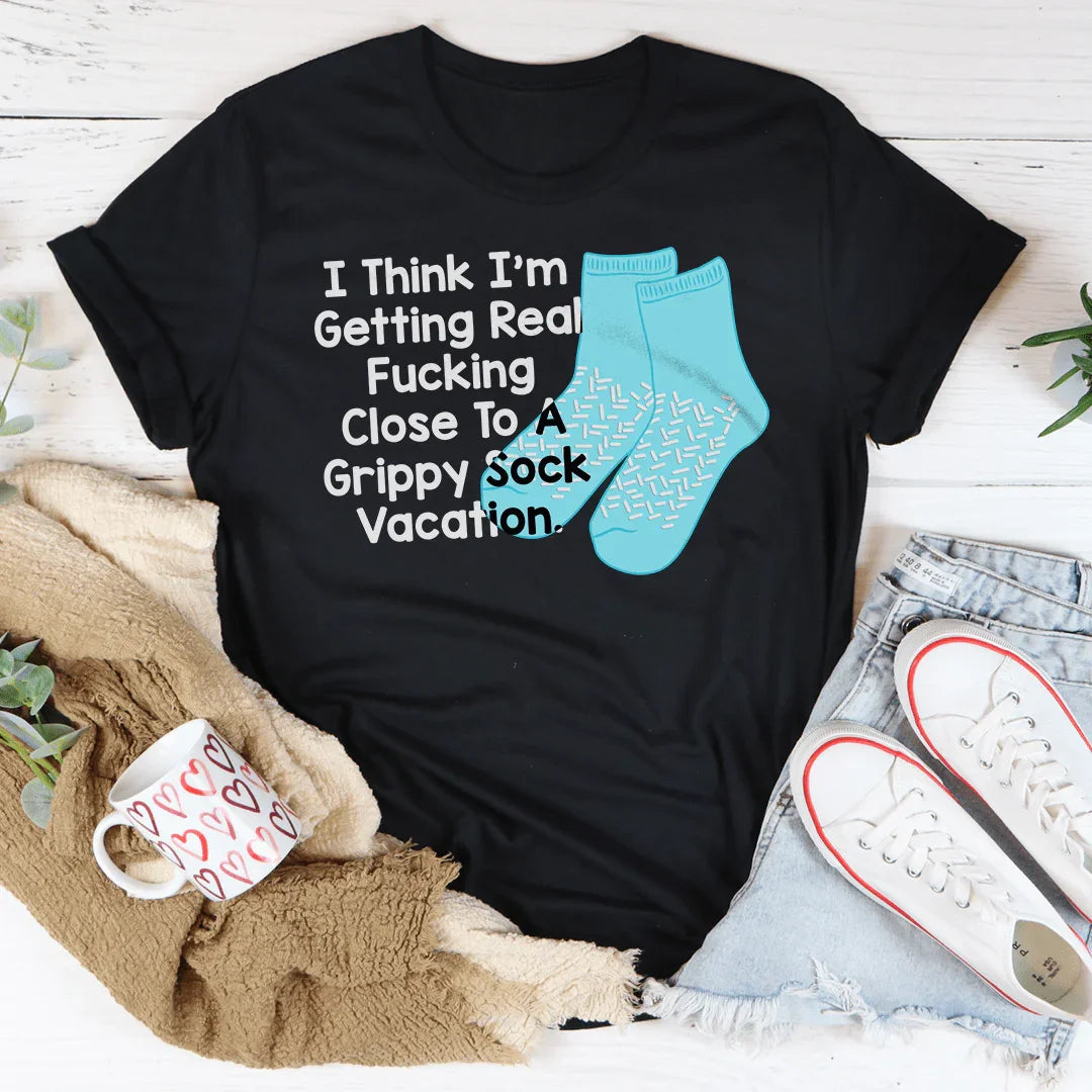 I Think I’m Getting Real F-cking Close To A Grippy Sock Vacation Tee Black Heather / S Peachy Sunday T-Shirt