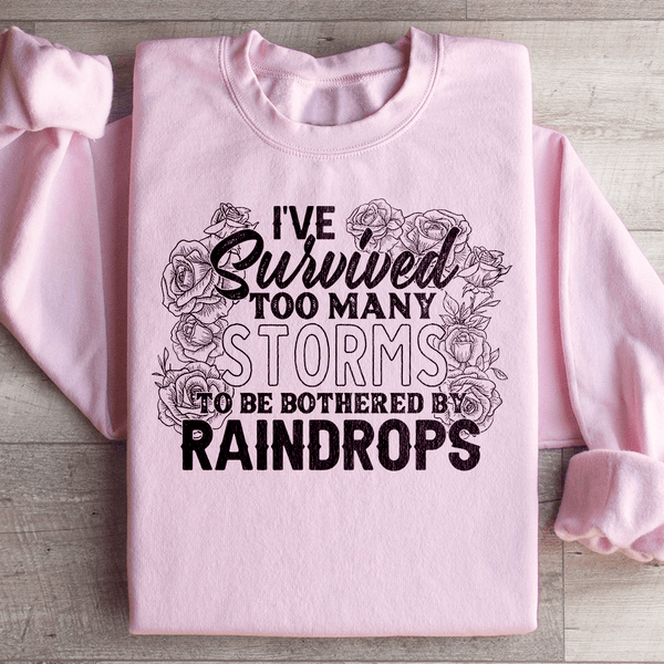 I've Survived Too Many Storms To Be Bothered By Raindrops Sweatshirt Light Pink / S Peachy Sunday T-Shirt