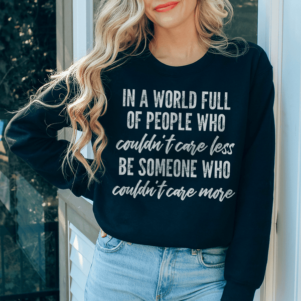 In A World Full Of People Who Couldn't Care Less Be Someone Sweatshirt Black / S Peachy Sunday T-Shirt