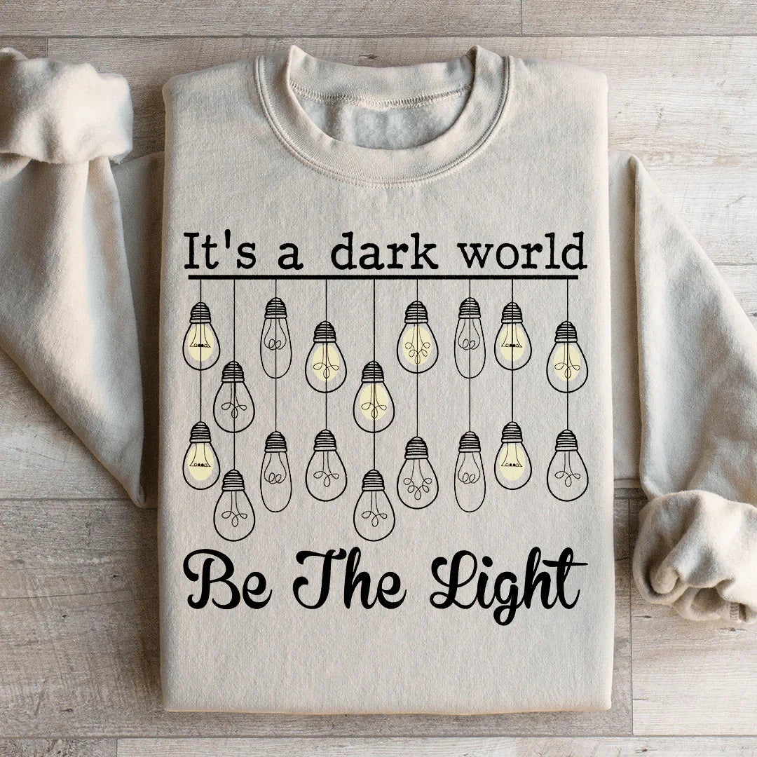 It's A Dark World Be The Light Sweatshirt Sand / S Peachy Sunday T-Shirt