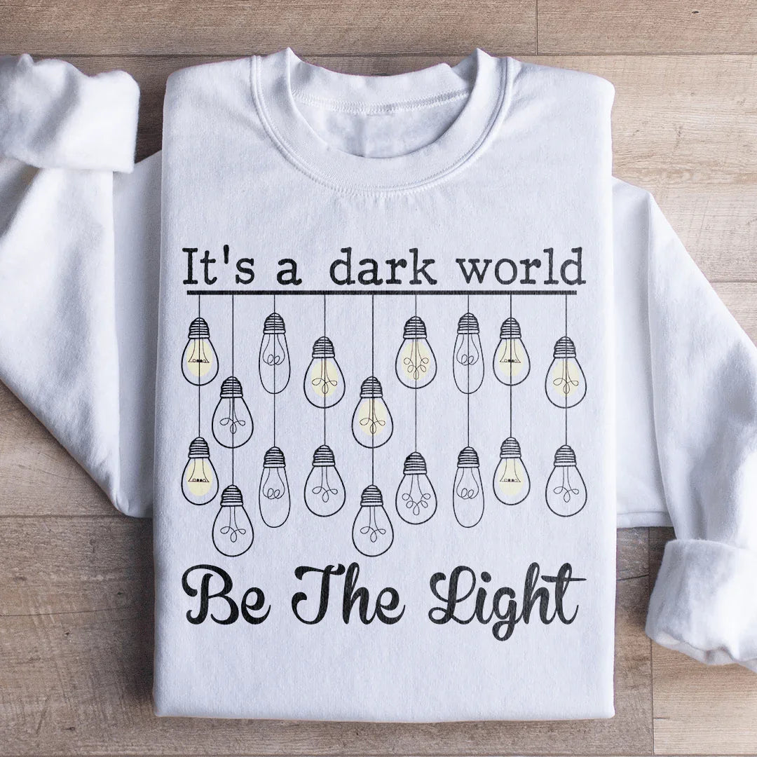 It's A Dark World Be The Light Sweatshirt White / S Peachy Sunday T-Shirt