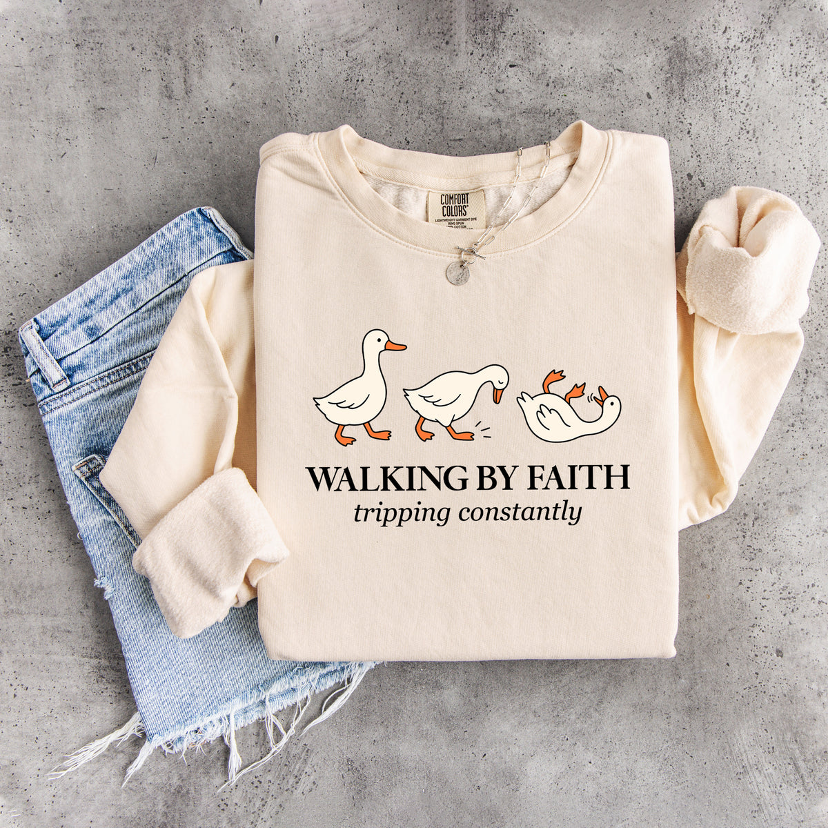Sudadera «Camino por fe, tropiezo constantemente»