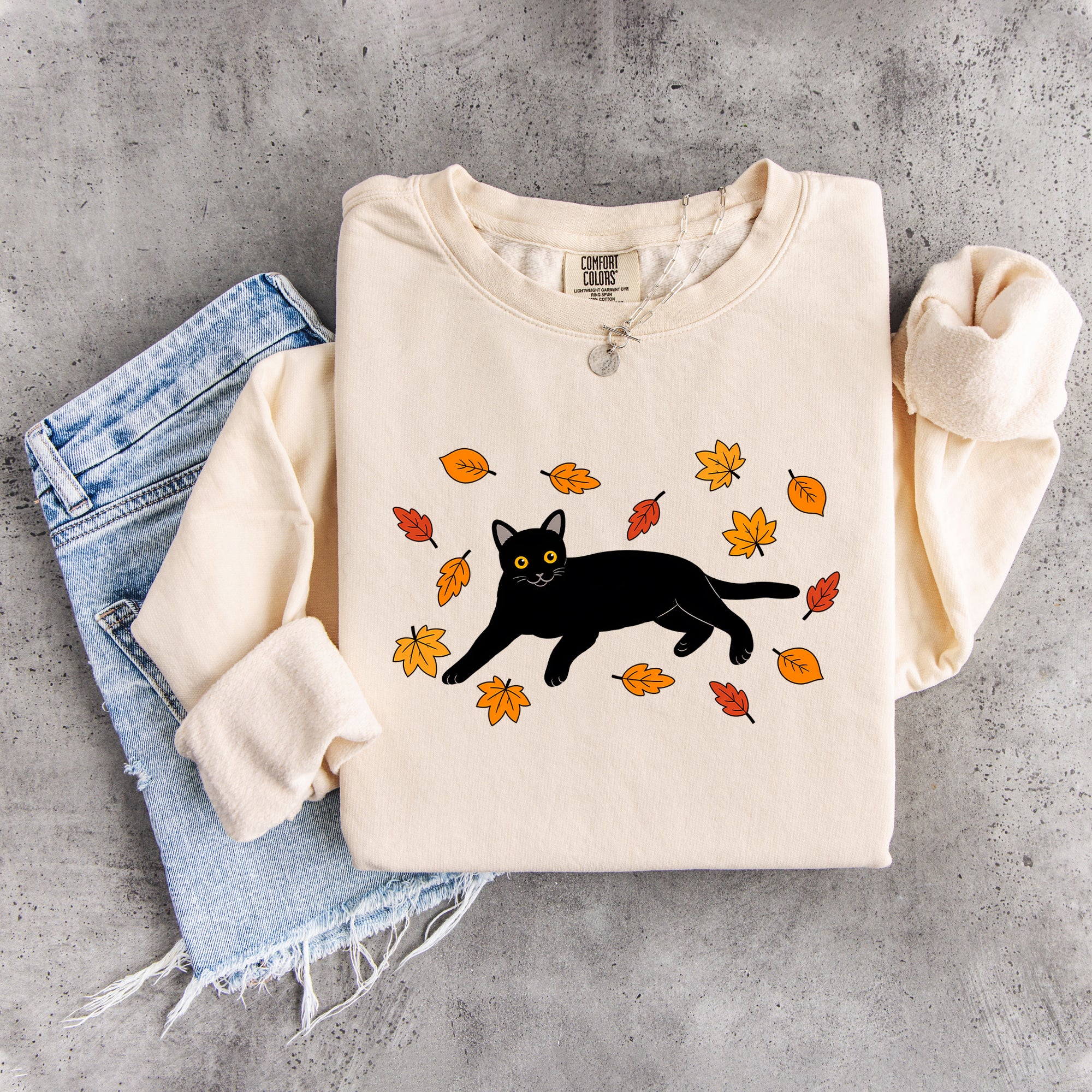 Sudadera otoñal de gato negro