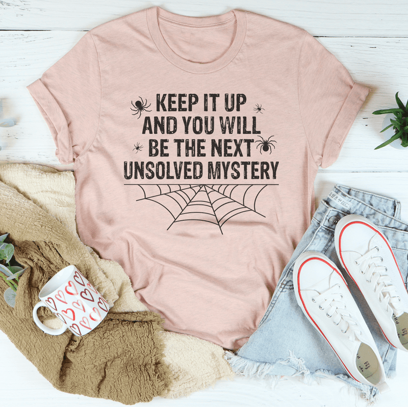 Keep It Up And You'll Be The Next Unsolved Mystery Tee Heather Prism Peach / S Peachy Sunday T-Shirt