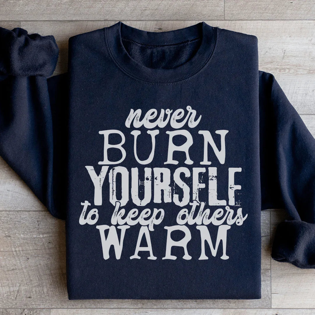 Never Burn Yourself To Keep Others Warm Sweatshirt Black / S Peachy Sunday T-Shirt