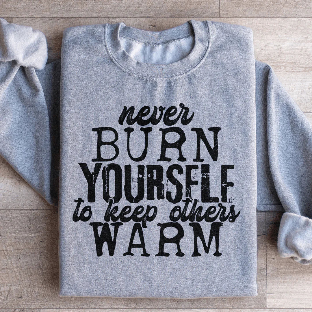 Never Burn Yourself To Keep Others Warm Sweatshirt Sport Grey / 2XL Peachy Sunday T-Shirt