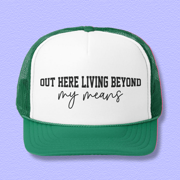 Out Here Living Beyond My Means Trucker Caps Green / One size Printify Hats T-Shirt