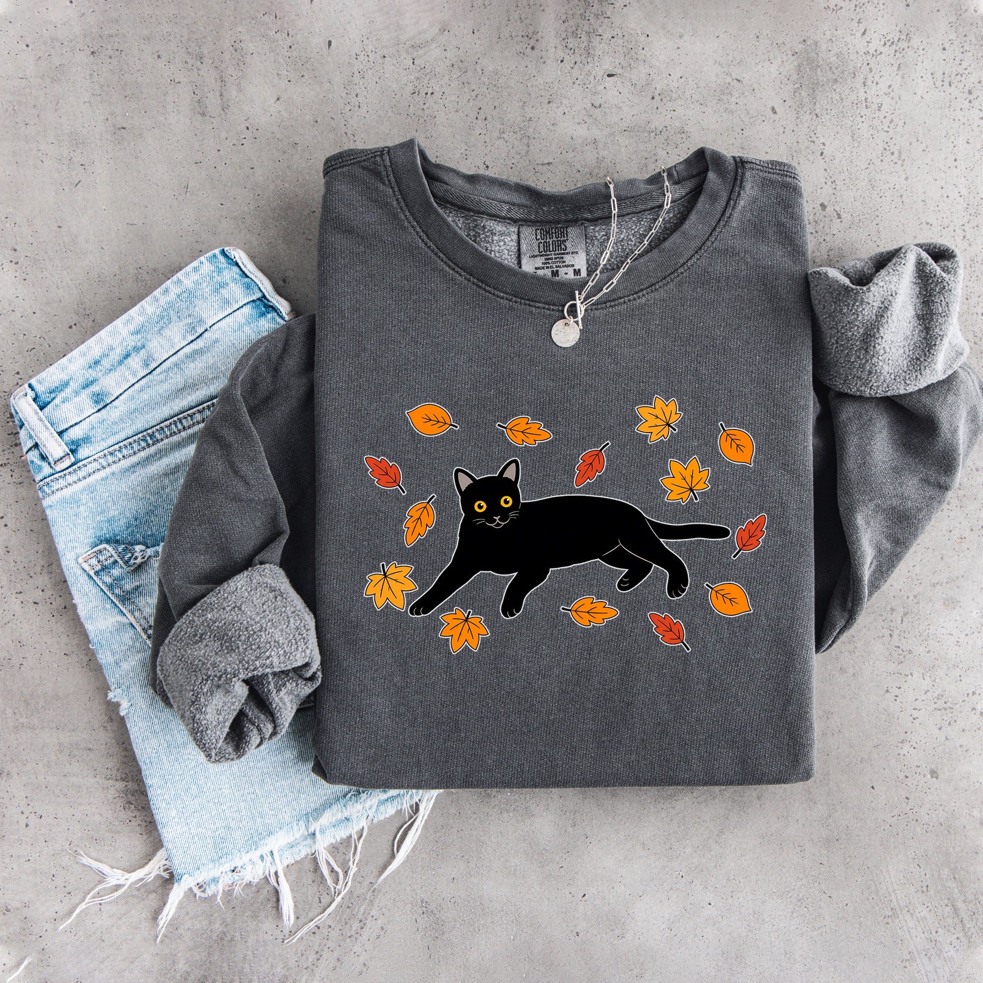 Sudadera otoñal de gato negro