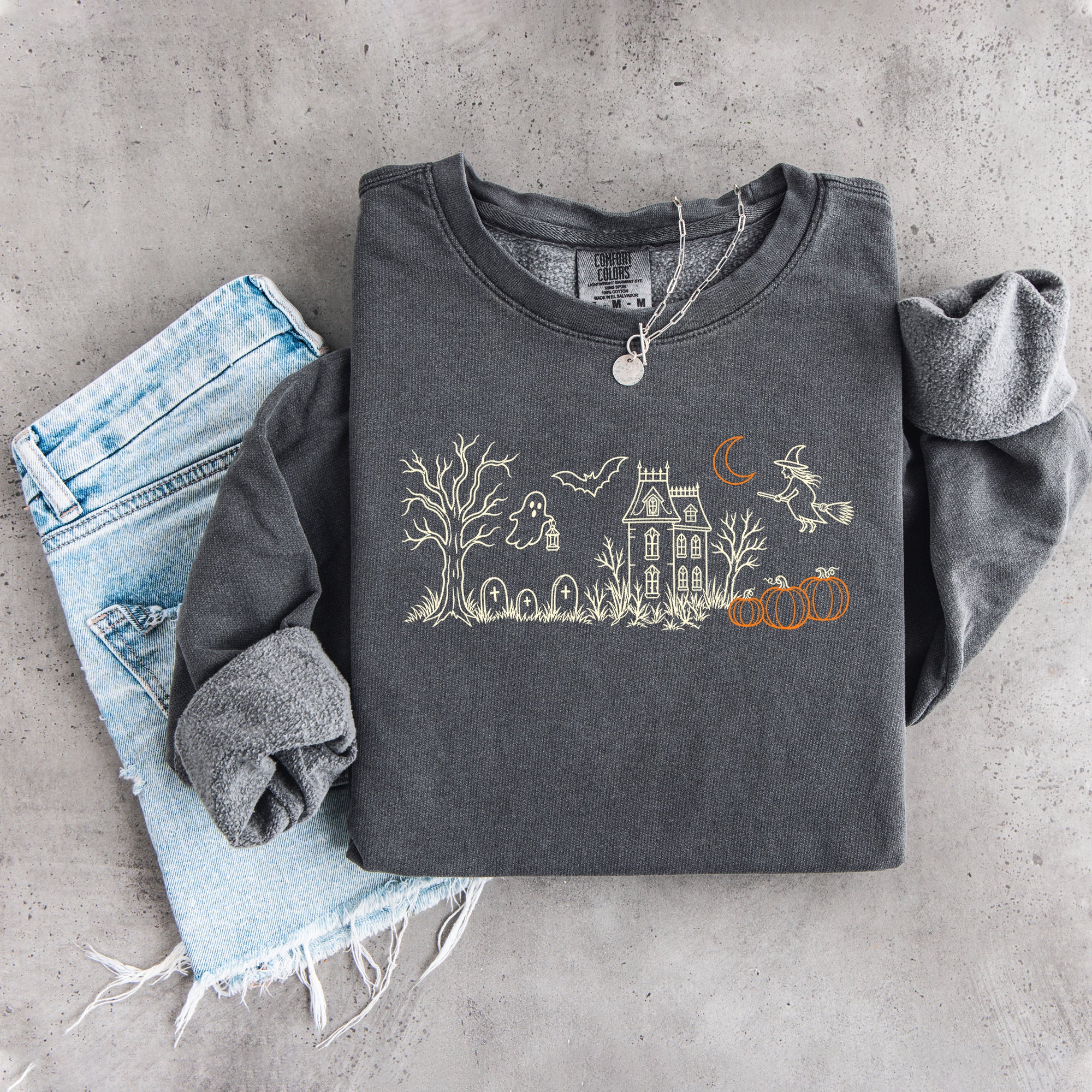 Sweat-shirt brodé « Manoir hanté »