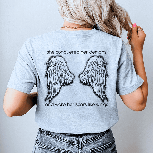 She Conquered Her Demons And Wore Her Scars Like Wings Tee Athletic Heather / S Peachy Sunday T-Shirt