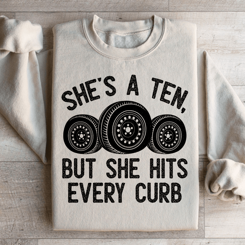 She's A Ten, But She Hits Every Curb Sweatshirt Sand / S Peachy Sunday T-Shirt