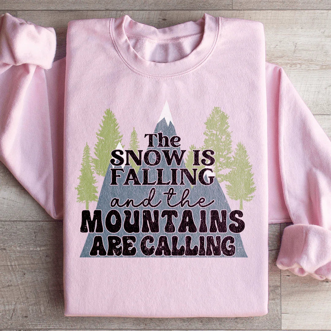 The Snow Is Falling And The Mountains Are Calling Sweatshirt Light Pink / S Peachy Sunday T-Shirt