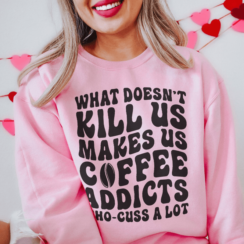 What Doesn't Kill Us Makes Us Coffee Addicts Sweatshirt Light Pink / S Peachy Sunday T-Shirt