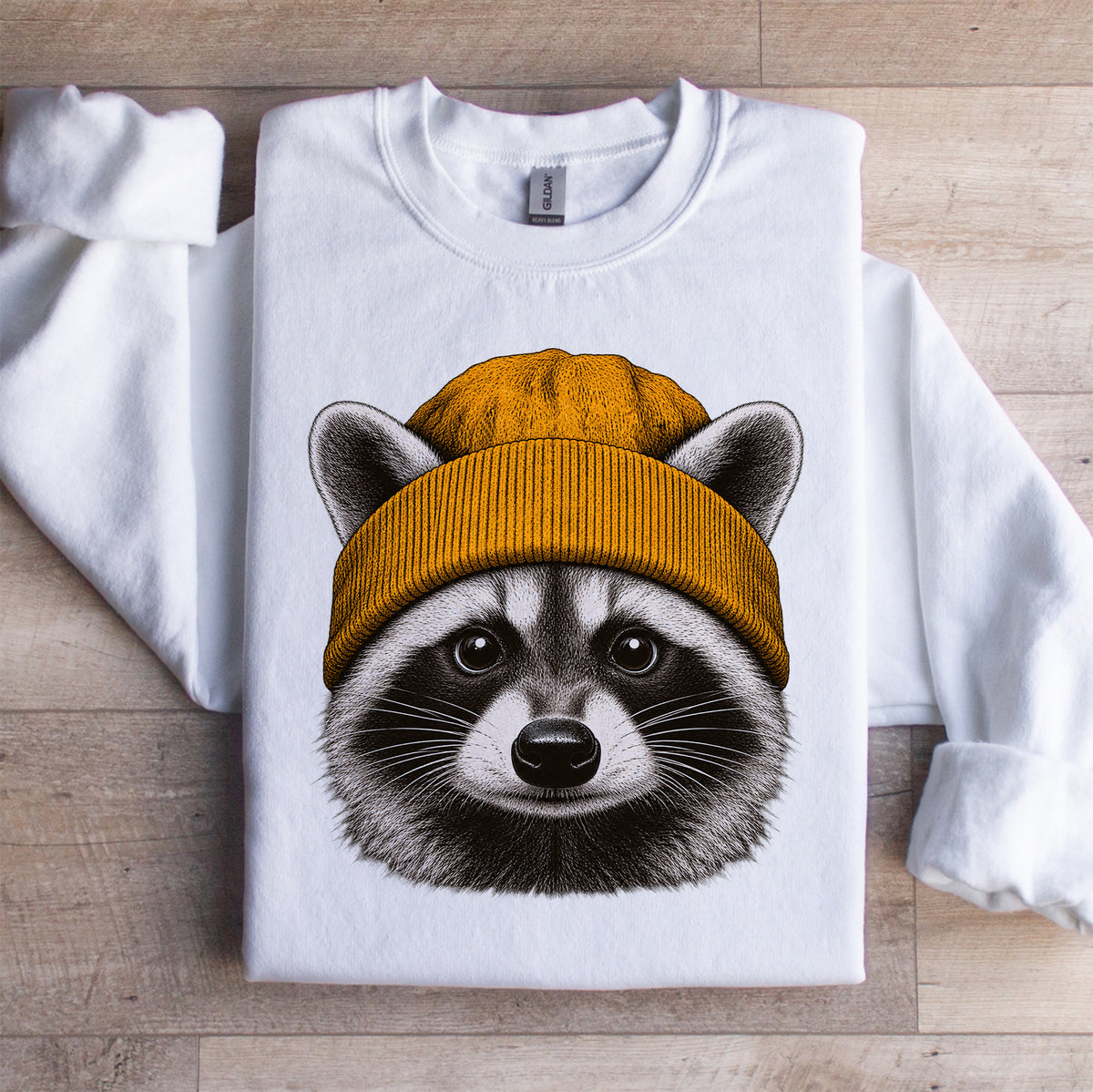 Sweat-shirt avec un raton laveur portant un bonnet