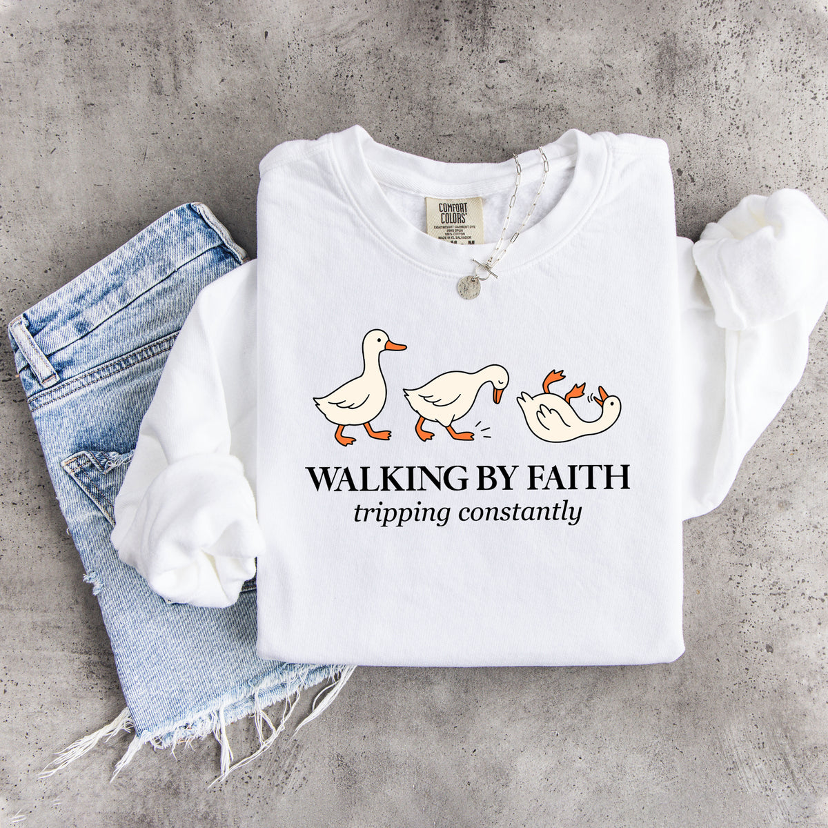 Sudadera «Camino por fe, tropiezo constantemente»