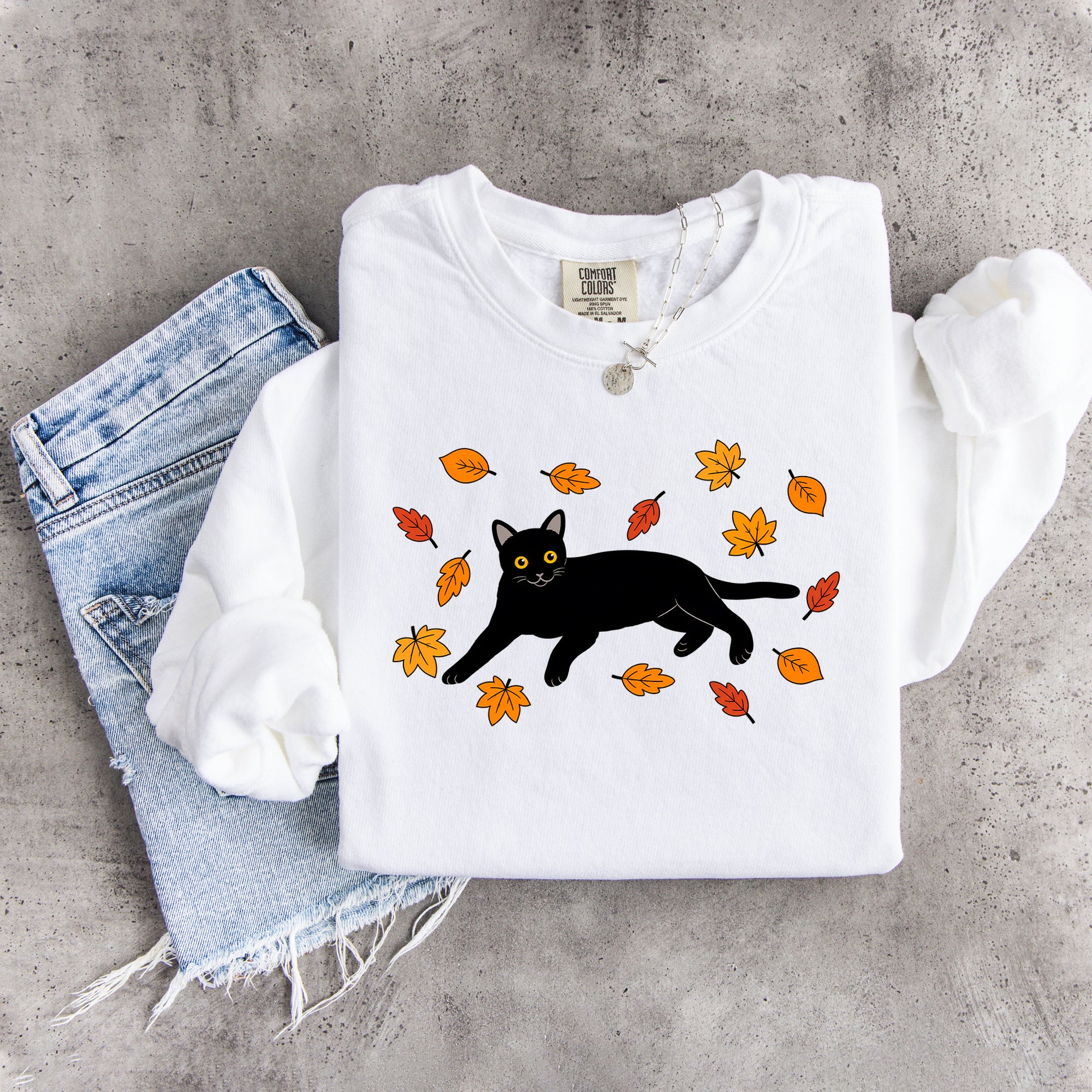 Sudadera otoñal de gato negro