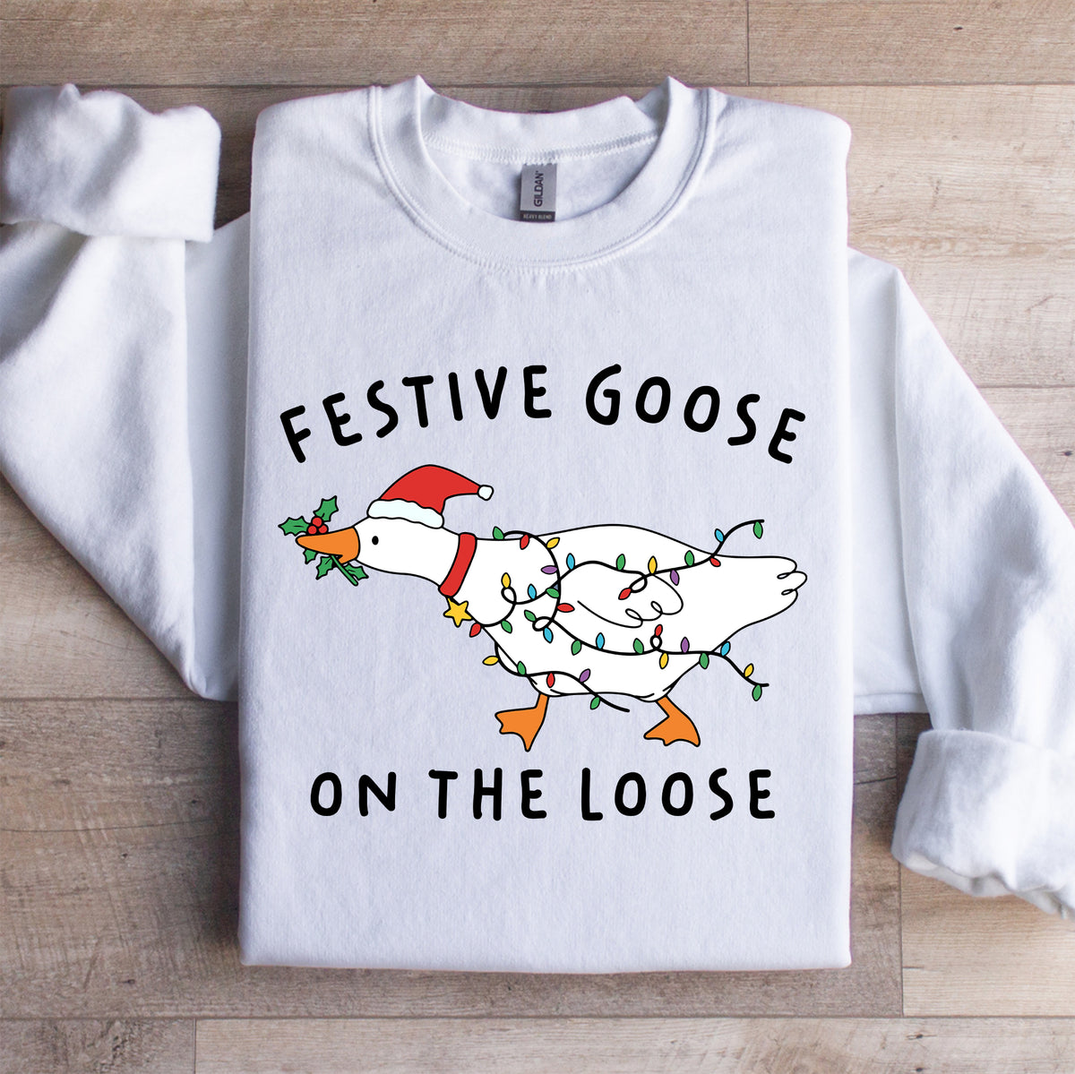 Sweat-shirt à col ras-du-cou « Malices des fêtes » amusant - oie festive en liberté
