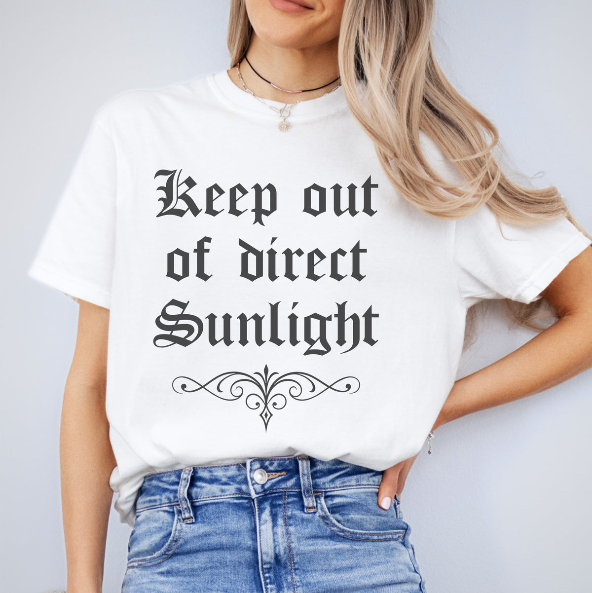 T-shirt « Tenir à l'écart de la lumière directe du soleil »