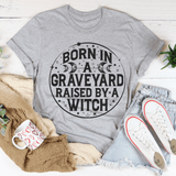 Born In A Graveyard Raised By A Witch Tee Peachy Sunday T-Shirt