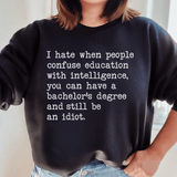 Don't Confuse Education With Intelligence Sweatshirt Black / S Peachy Sunday T-Shirt