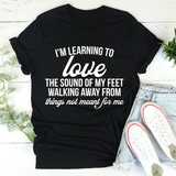 I'm Learning To Love The Sound Of My Feet Walking Away Tee Black Heather / S Peachy Sunday T-Shirt