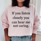 If You Listen Closely You Can Hear Me Not Caring Sweatshirt Light Pink / S Peachy Sunday T-Shirt