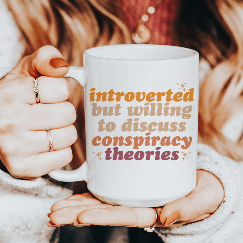 Introverted But Willing To Discuss Conspiracy Theories Ceramic Mug 15 oz White / One Size CustomCat Drinkware T-Shirt