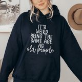 It's Weird Being The Same Age As Old People Hoodie Black / S Peachy Sunday T-Shirt