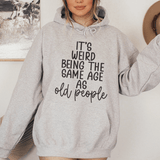 It's Weird Being The Same Age As Old People Hoodie Sport Grey / S Peachy Sunday T-Shirt