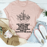 Life Isn't About Waiting For The Storm To Pass Tee Peachy Sunday T-Shirt