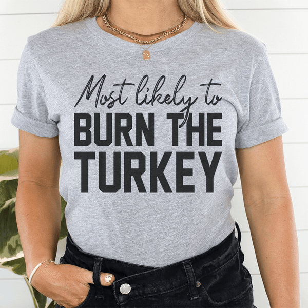 Most Likely To Burn The Turkey Thanksgiving Tee Athletic Heather / S Peachy Sunday T-Shirt