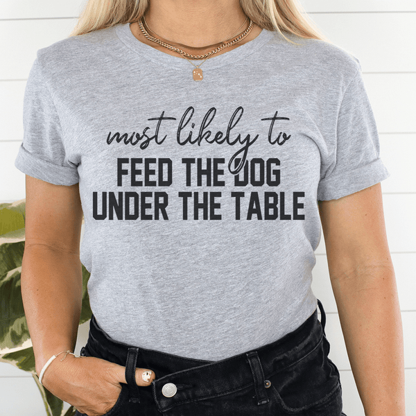 Most Likely To Feed The Dog Under The Table Thanksgiving Tee Athletic Heather / S Peachy Sunday T-Shirt