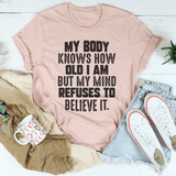 My Body Knows How Old I Am But My Mind Refuses To Believe It Tee Heather Prism Peach / S Peachy Sunday T-Shirt