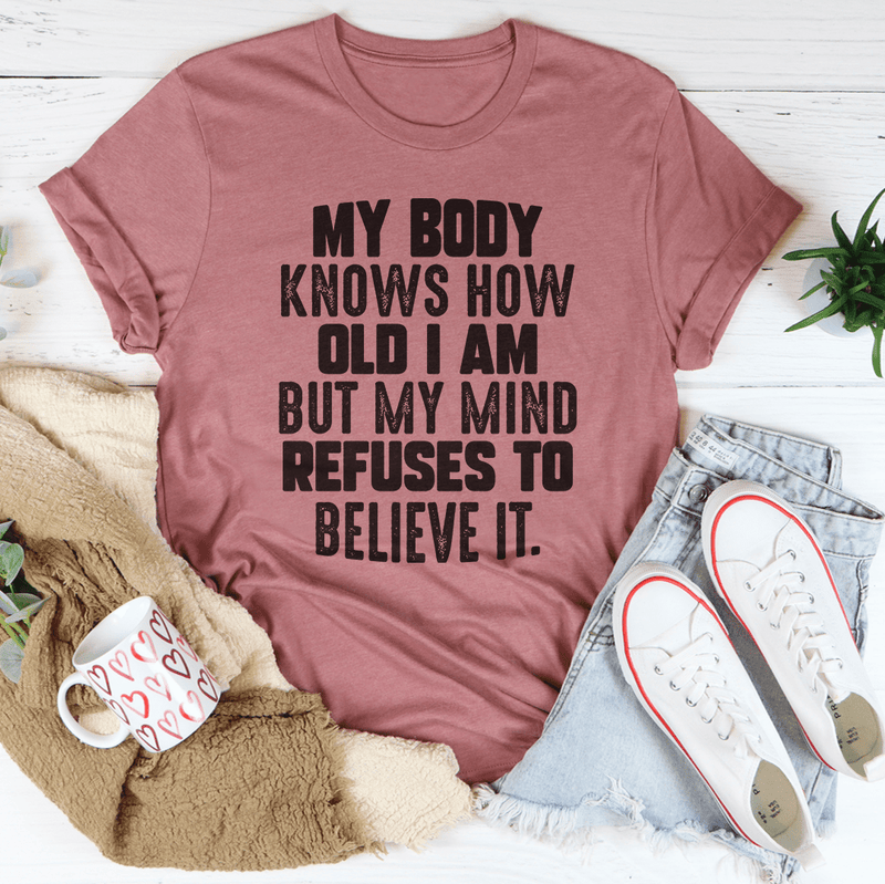My Body Knows How Old I Am But My Mind Refuses To Believe It Tee Mauve / S Peachy Sunday T-Shirt