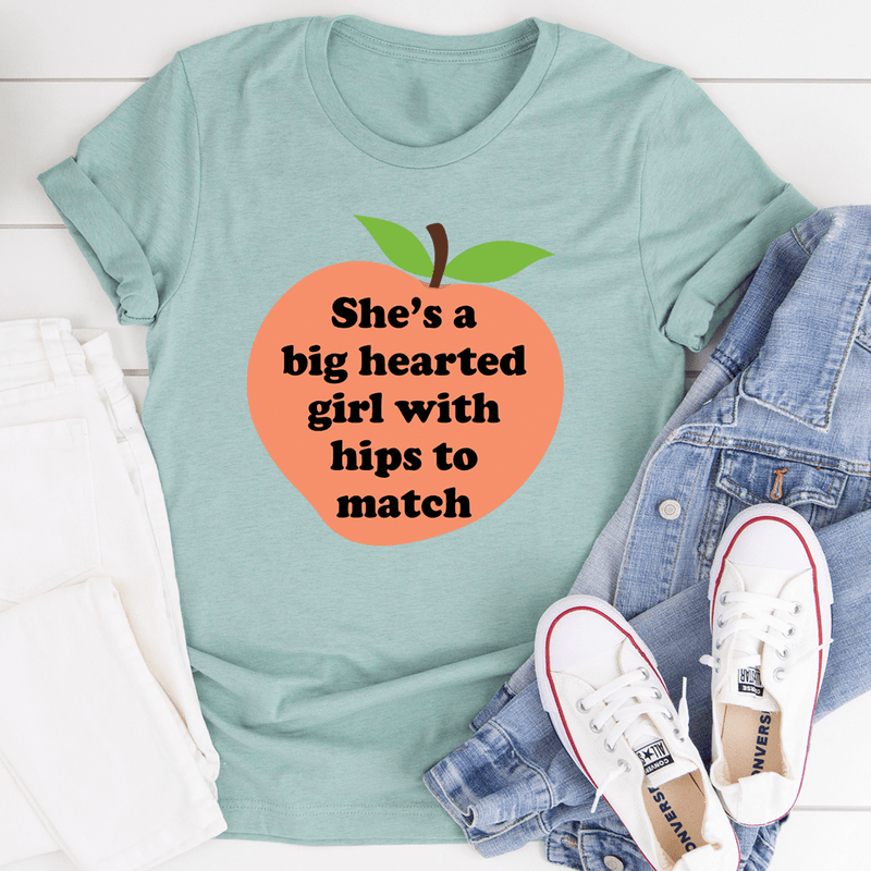She's A Big Hearted Girl With Hips to Match Tee Heather Prism Dusty Blue / S Peachy Sunday T-Shirt