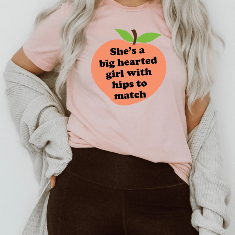 She's A Big Hearted Girl With Hips to Match Tee Pink / S Peachy Sunday T-Shirt