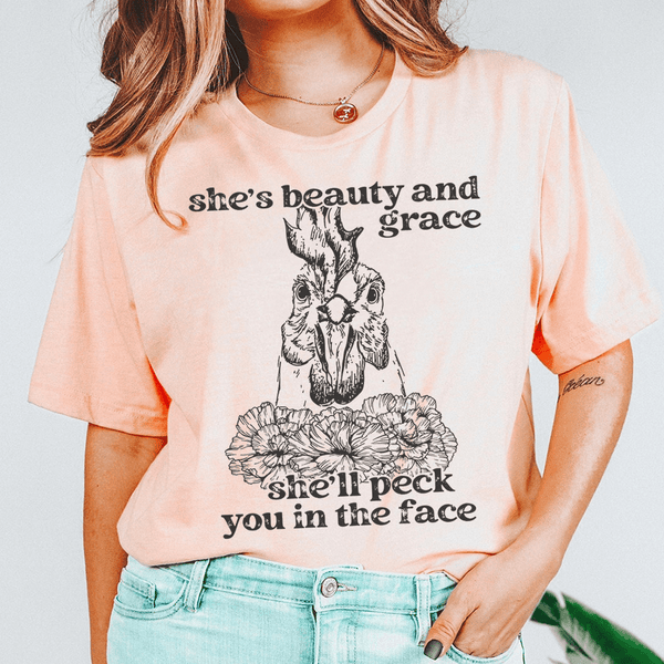 She's Beauty And Grace She'll Peck You In The Face Tee Heather Prism Peach / S Peachy Sunday T-Shirt