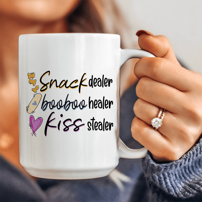 Snack Dealer Booboo Healer Kiss Stealer Ceramic Mug 15 oz White / One Size CustomCat Drinkware T-Shirt