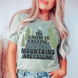 The Snow Is Falling And The Mountains Are Calling Tee Heather Prism Dusty Blue / S Peachy Sunday T-Shirt