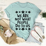 We Are Not What People Do To Us Tee Heather Prism Dusty Blue / S Peachy Sunday T-Shirt