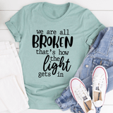 We're All Broken That's How The Light Gets In T-Shirt Heather Prism Dusty Blue / S Peachy Sunday T-Shirt